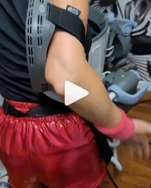 EmSculpt Neo applicator on a patient's arm